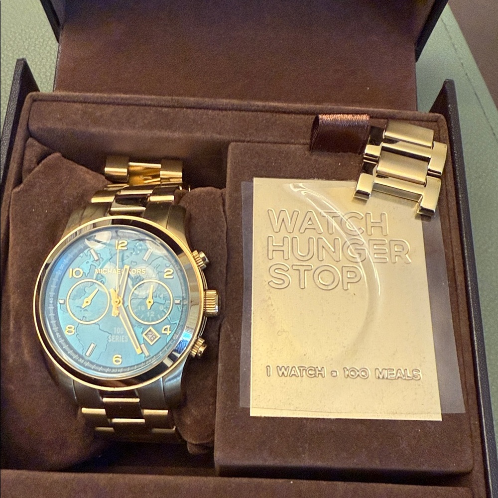 Michael Kors Gold and Blue Watch Hunger Stop